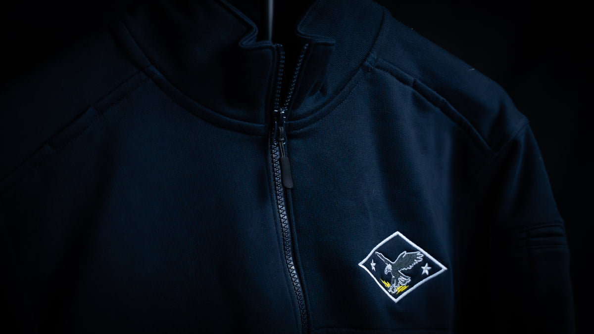 TEAM QUARTER-ZIP PREMIUM (PATROL BLUE)